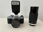Canon AV-1 analoge spiegelreflex canera met twee lenzen, Audio, Tv en Foto, Fotocamera's Analoog, Ophalen of Verzenden, Zo goed als nieuw