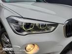 BMW X1 sDrive20i Executive Automaat / Xenon / Cruise / Clima, 1998 cc, Stof, Zwart, Wit