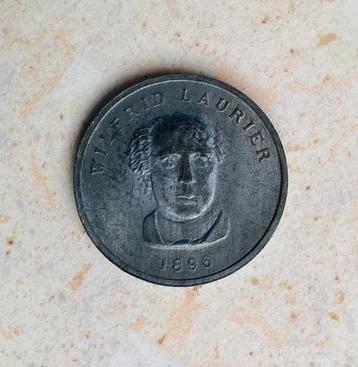 Antieke gedenkmunt Canada 1896. Min.Pres. Laurier. beschikbaar voor biedingen