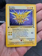 Zapdos Fossil 1e Editie, Hobby en Vrije tijd, Verzamelkaartspellen | Pokémon, Ophalen of Verzenden, Zo goed als nieuw, Losse kaart
