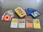 OPRUIMING: Pokemon mystery tins met Pokemonkaarten, Nieuw, Foil, Ophalen of Verzenden, Meerdere kaarten