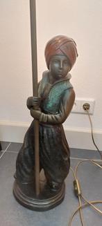 Bronzen beeld van Moor, Ophalen