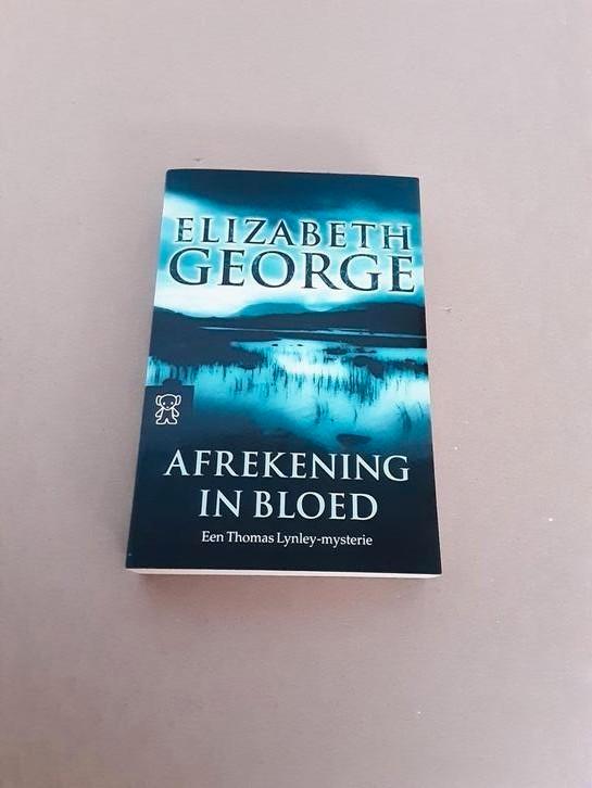 Elizabeth George - Afrekening in bloed, Boeken, Thrillers, Gelezen, Ophalen of Verzenden