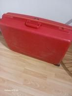 Rode Delsey Koffer met Wieltjes, Ophalen