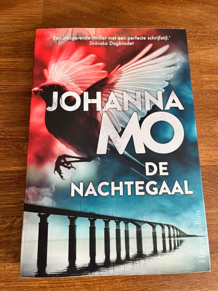 De Nachtegaal - Johanna Mo, Boeken, Thrillers, Zo goed als nieuw, Europa overig, Ophalen of Verzenden