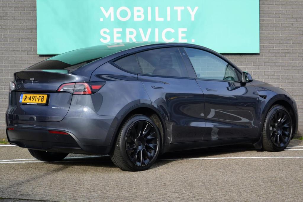 Tesla Model Y Long Range AWD 75 kWh SOH91% Pano LED Leder AU, Auto's, Tesla, Stoelverwarming, Gebruikt, Leder, 351 pk