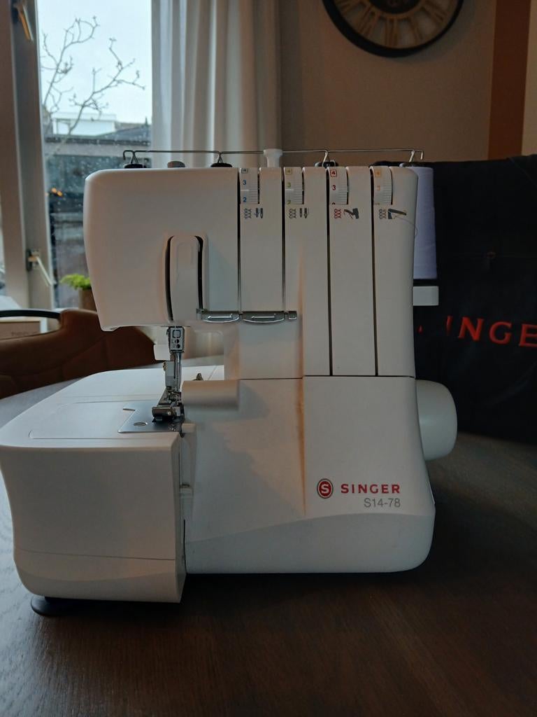 Singer lockmachine S14-78, Ophalen
