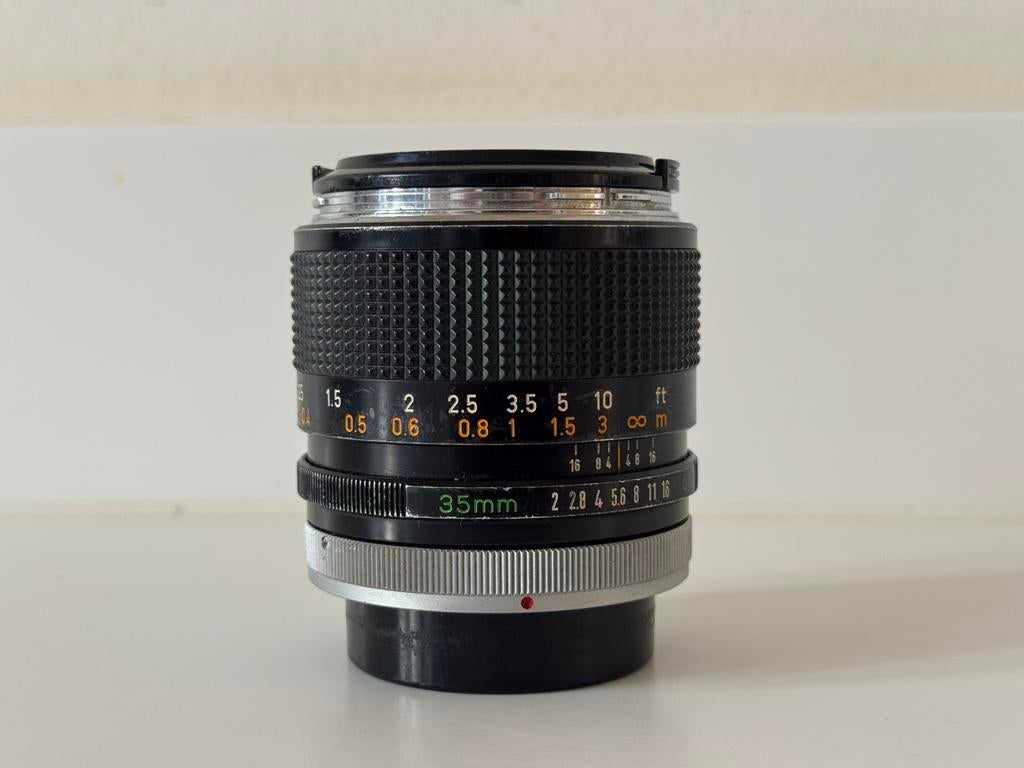 Canon FD 35mm f/2 concave, Ophalen of Verzenden, Gebruikt, Groothoeklens