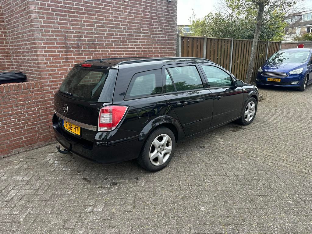 Opel Astra 1.6 16V 85KW St.wgn. 2007 Zwart, Auto's, Opel, Voorwielaandrijving, 657 kg, 15 km/l, 4 cilinders