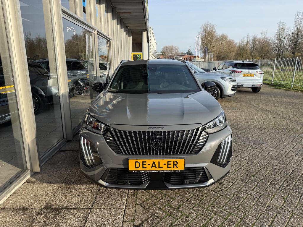 Peugeot 2008 1.2 PureTech PK130 / ACHTERUITRIJCAMERA / NAVIG, Auto's, Peugeot, Gebruikt, Zwart, 1199 cc, Leder en Stof