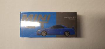 MINI GT Nissan Skyline GT-R V-Spec 2 (R34) Bayside Blue beschikbaar voor biedingen