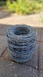 Gegalvaniseerde rol prikkeldraad ongebruikt. Ca. 20-30 mtr., Tuin en Terras, Gaas en Draad, Ophalen, Zo goed als nieuw, 20 meter of meer