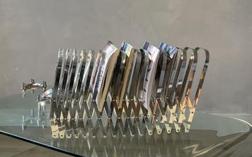 Harmonica tijdschriftenrek verchroomd staal beschikbaar voor biedingen