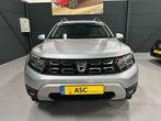 Dacia Duster 1.3 TCe 150pk Extreme (Automaat) - Navigatie -, Auto's, Dacia, Gebruikt, 4 cilinders, Bedrijf, Zilver of Grijs