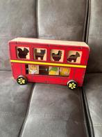 Houten speelbus, Ophalen