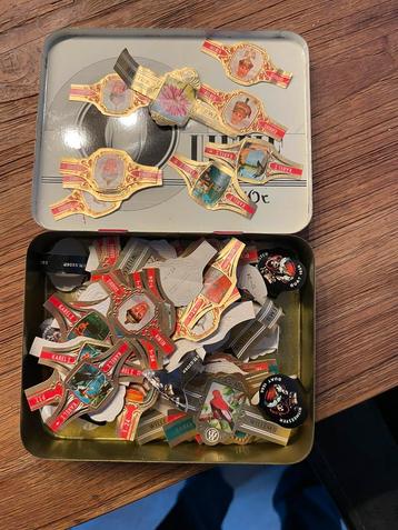 Blikje met ongebruikte sigarenbandjes beschikbaar voor biedingen