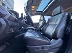 Mitsubishi Outlander 2.0 Edition Two DAK|AUT|CLIMATE|CRUISE|, Auto's, Mitsubishi, Zwart, 4 cilinders, Bruin, Bedrijf