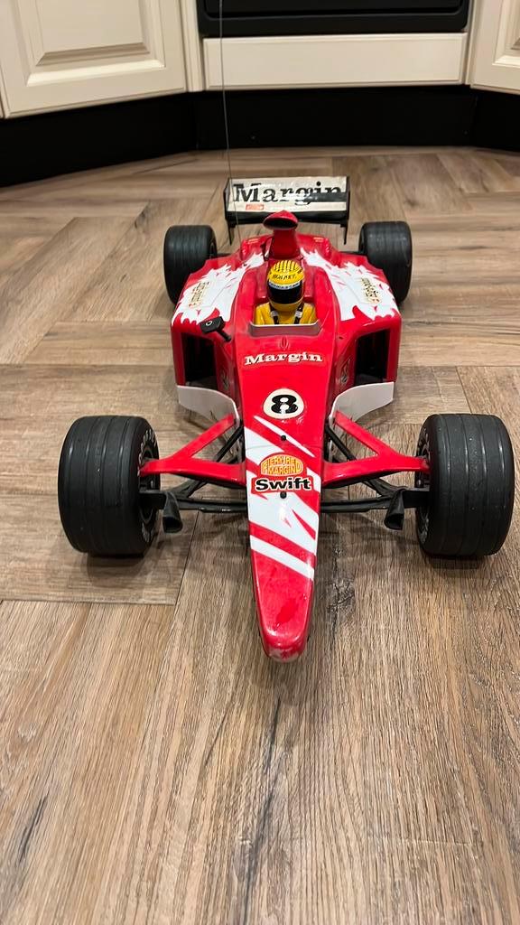 Mooie bestuurbare raceauto tekoop, Hobby en Vrije tijd, Modelbouw | Radiografisch | Auto's, Gebruikt, Elektro, Overige schalen