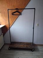 verrijdbaar kledingrek, Ophalen