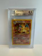 Charizard Base Set 4/102 Beckett 6.5, Hobby en Vrije tijd, Verzamelkaartspellen | Pokémon, Ophalen of Verzenden, Zo goed als nieuw