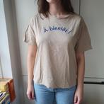 Nieuw beige shirt met kobaltblauwe tekst à bientôt Monki M, Kleding | Dames, Maat 38/40 (M), Beige, Nieuw, Ophalen of Verzenden