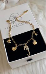 Gouden bedelarmband met zeethema, Staal, Nieuw, Ophalen of Verzenden, Met bedels of kralen