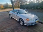 Hyundai Coupé 2.0 2004 Grijs, Auto's, Hyundai, 65 €/maand, 142 pk, 4 stoelen, Origineel Nederlands