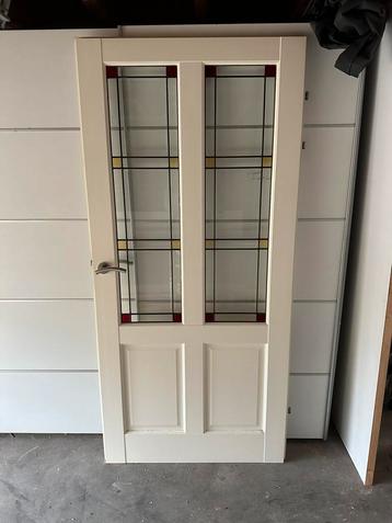 Opdekdeur met facet glas beschikbaar voor biedingen