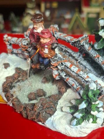 Kerstdorp Tafereel: Vissen in de Sneeuw beschikbaar voor biedingen