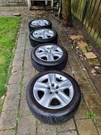 winterbanden opel met velg en wieldoppen 225/50 R17 Pirelli, Auto-onderdelen, Banden en Velgen, Ophalen, Gebruikt, 17 inch, Winterbanden