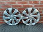 2 originele Toyota Aygo en Yaris wieldoppen 14 inch, Ophalen of Verzenden, Gebruikt