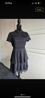 mini jurk van kant en plisse, Kleding | Dames, Jurken, Verzenden, Zo goed als nieuw, Zwart, Boven de knie