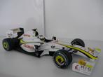 Formule 1 modelauto 1:18 2009 Jenson Button Brawn GP, Hobby en Vrije tijd, Modelauto's | 1:18, Ophalen of Verzenden, Gebruikt