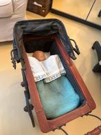 Antieke poppenwagen, Ophalen