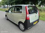 Daihatsu Cuore 1.0-12V Nagano*AUTOMAAT*NEW APK 07/26, Auto's, Stof, Zwart, 18 €/maand, Beige