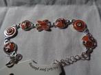 zilverkl met bruin en kristal steentjes nr arm 906, Ophalen of Verzenden, Nieuw, Bruin, Overige materialen