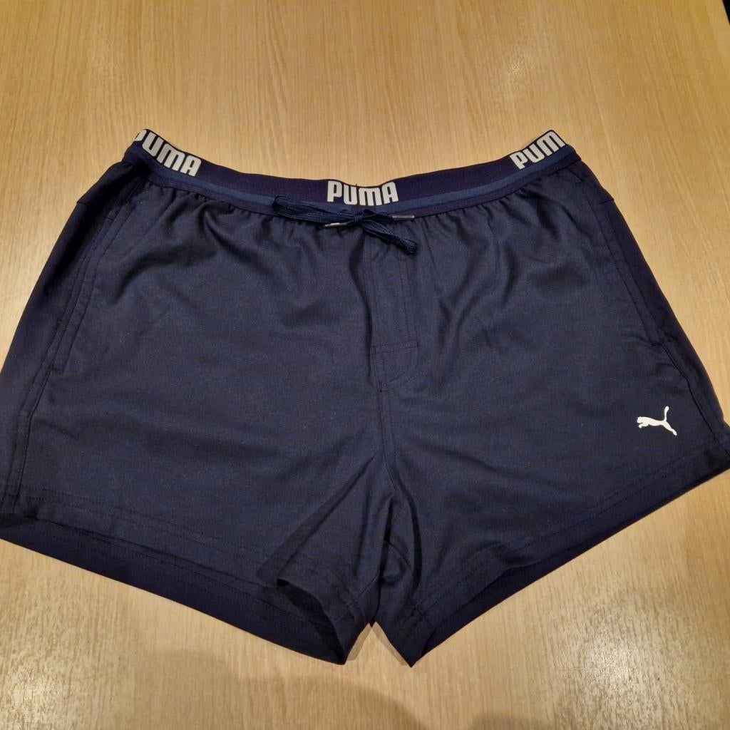 Puma zwemshort donkerblauw, Kleding | Dames, Sportkleding, Ophalen of Verzenden, Zo goed als nieuw, Puma, Blauw
