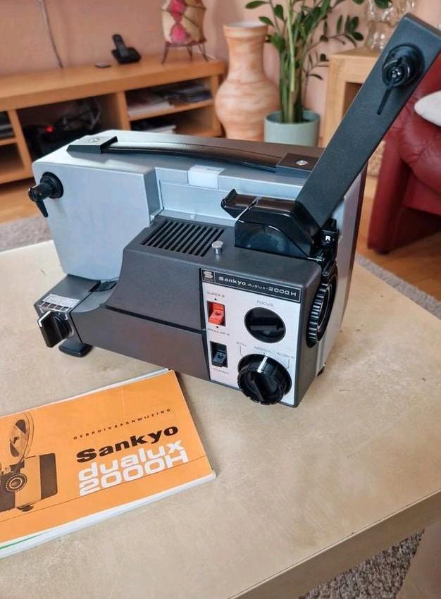Sankyo Dualux 2000H Super 8 Filmprojector met handleiding, Audio, Tv en Foto, Diaprojectors, Gebruikt, Ophalen of Verzenden