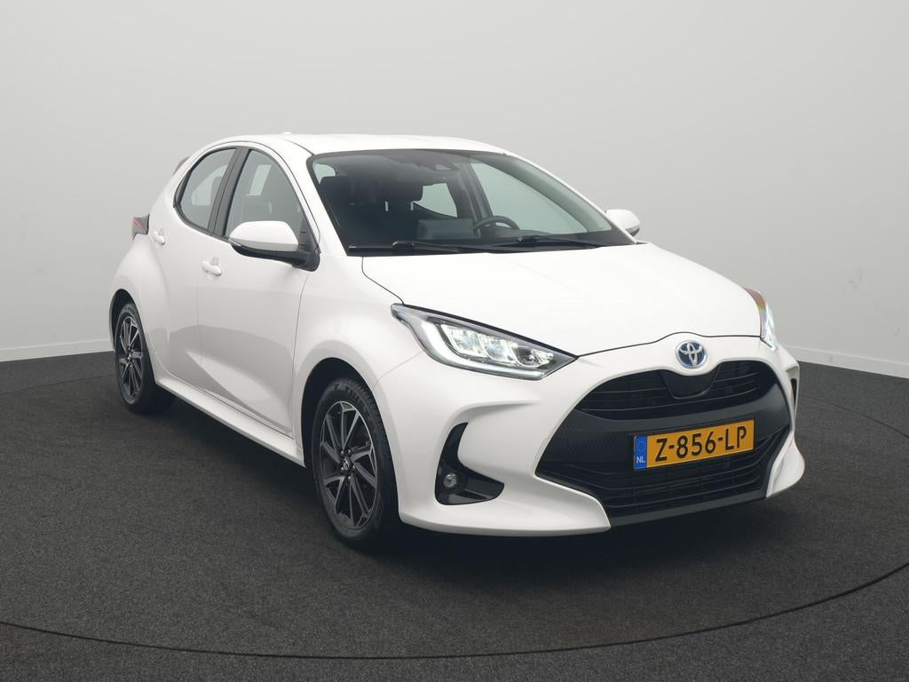 Toyota Yaris 1.5 Hybrid Dynamic - Occasion Lease vanaf €41, Auto's, 12 maanden, Gebruikt, 1490 cc, Bedrijf