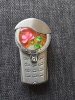 Aansteker Motorola V170 met oplichtend bloemmotief., Ophalen of Verzenden, Gebruikt, Aansteker