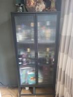 Vitrinekast Kwantum, Ophalen