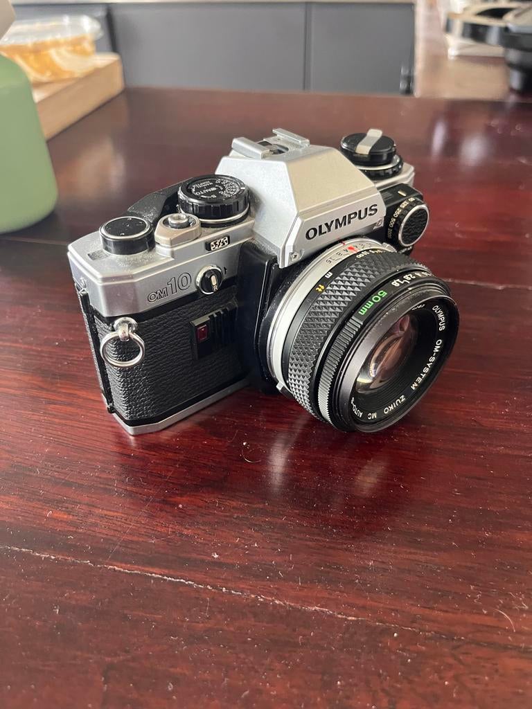 Olympus OM10 spiegelreflexcamera met 50mm lens, Ophalen of Verzenden, Gebruikt, Spiegelreflex, Olympus