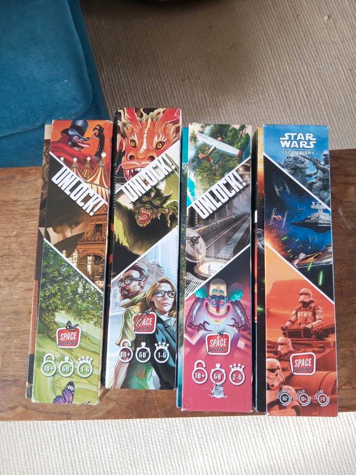 Vier varianten van Unlock, Hobby en Vrije tijd, Gezelschapsspellen | Bordspellen, Ophalen of Verzenden