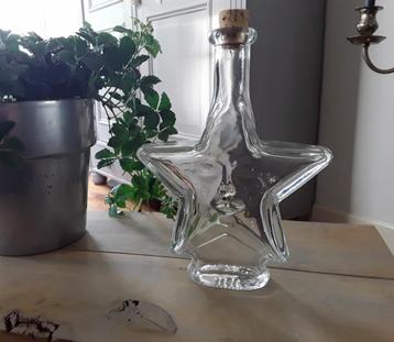 Fles met kurk in stervorm met gezicht  beschikbaar voor biedingen