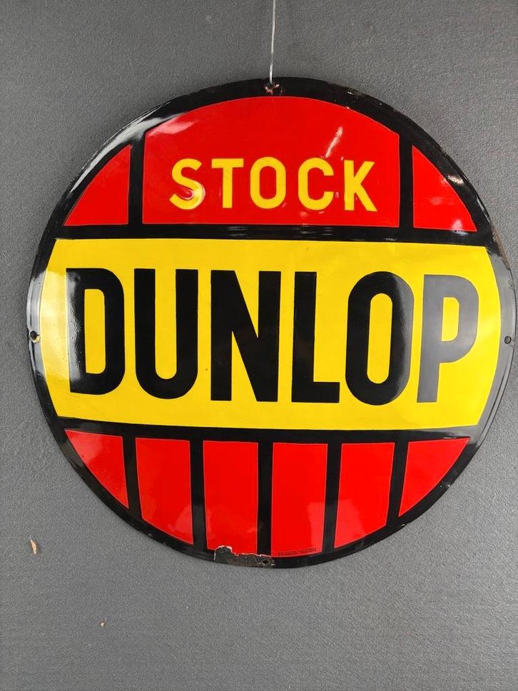 Oud origineel emaille reclamebord circa 1930 stock Dunlop, Verzamelen, Merken en Reclamevoorwerpen, Gebruikt, Reclamebord, Ophalen of Verzenden