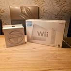 Complete Nintendo Wii in Doos met Stuurwiel in doos, Ophalen of Verzenden, Zo goed als nieuw, Met 1 controller, Met games