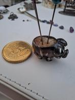 Zilveren speldenkussen varkentje, Ophalen