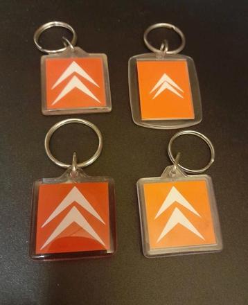 Vier heldere sleutelhangers Citroën garages  beschikbaar voor biedingen