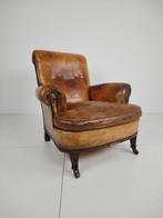 Een Klassieke Engelse Lederen clubchair fauteuil uit 1912, Ophalen