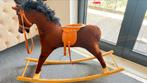 Speelgoed paard, Ophalen